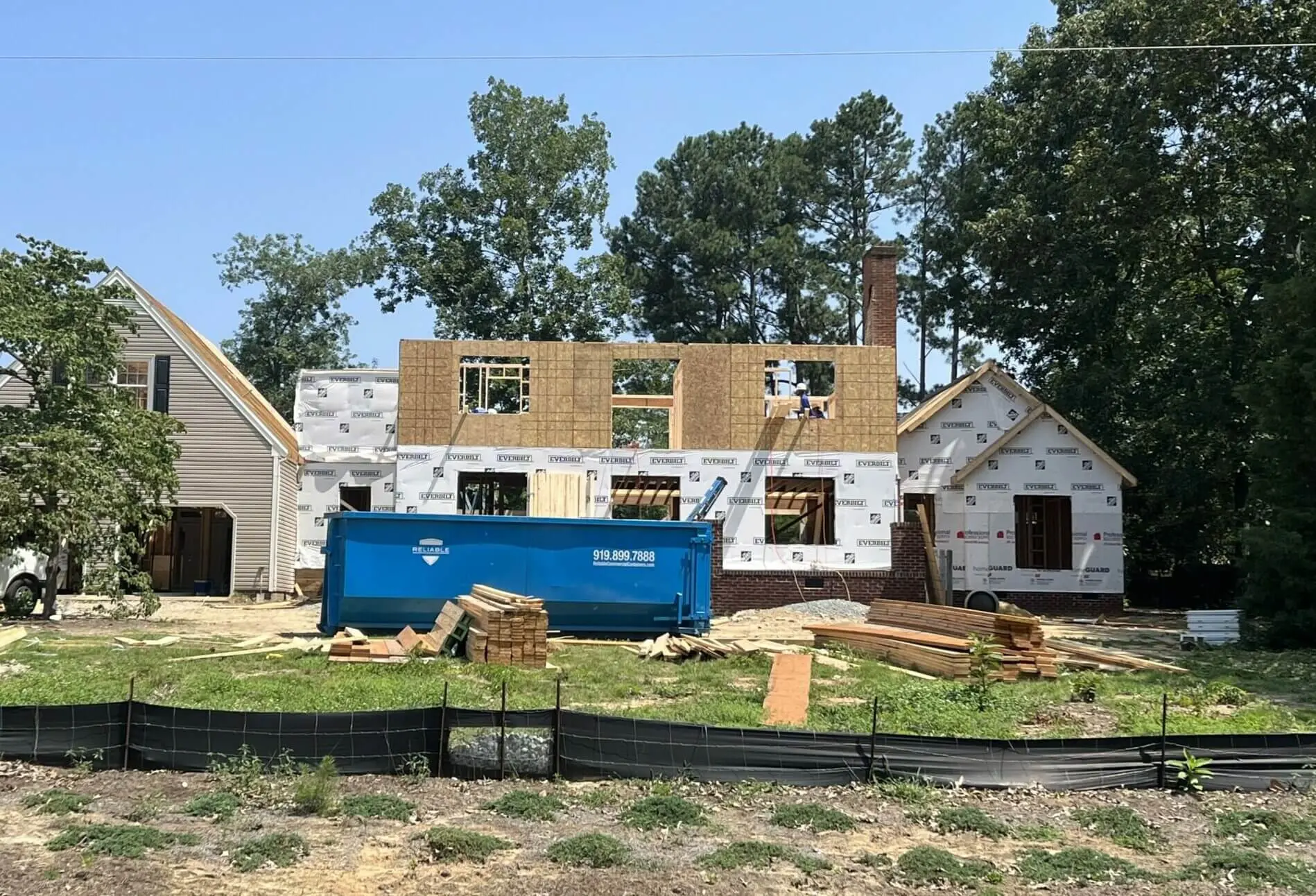 Reliable roll-off dumpster serving a residential construction project